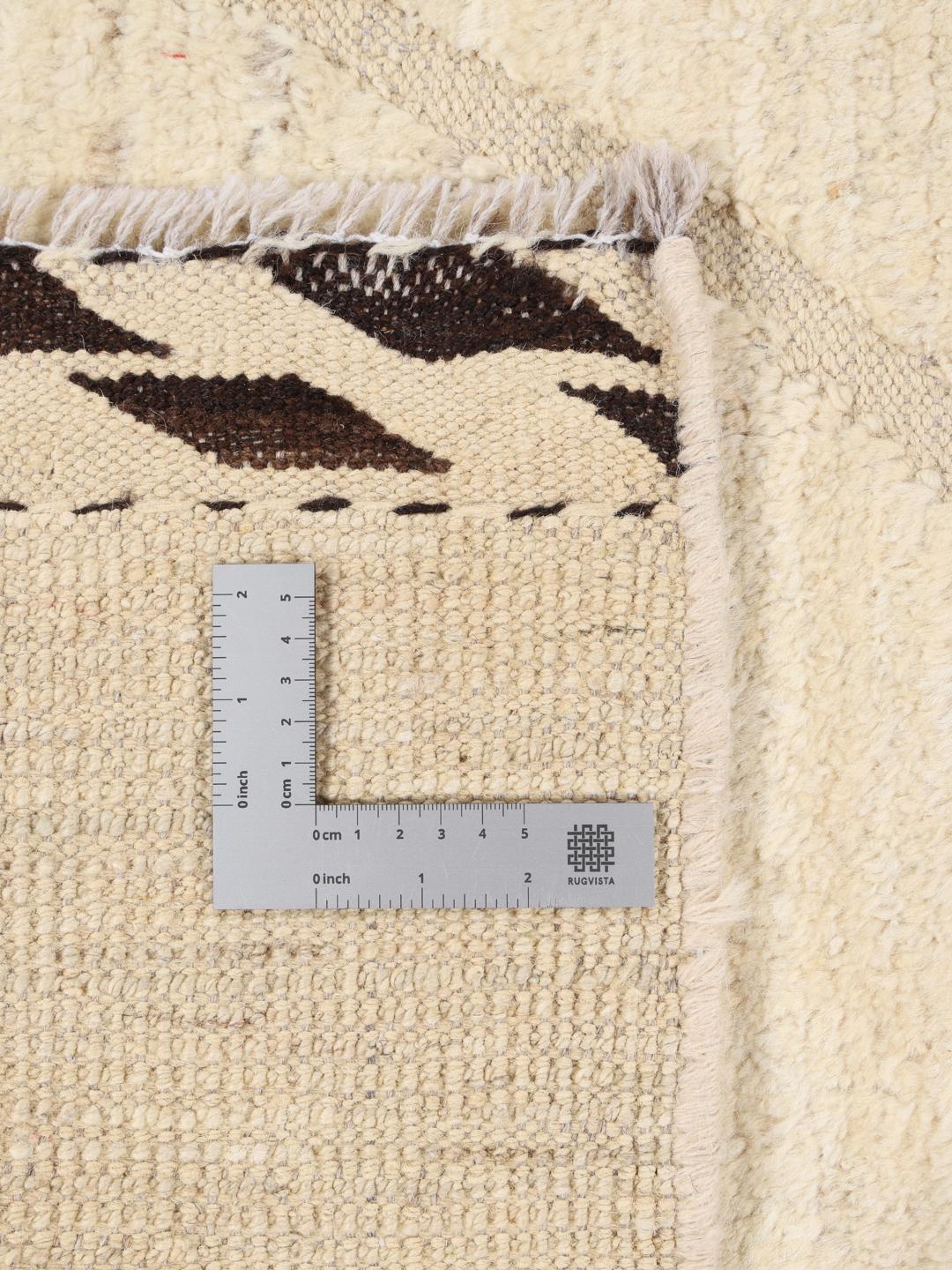 Handmade Berber style rug from Afghanistan in beige with a diamond pattern