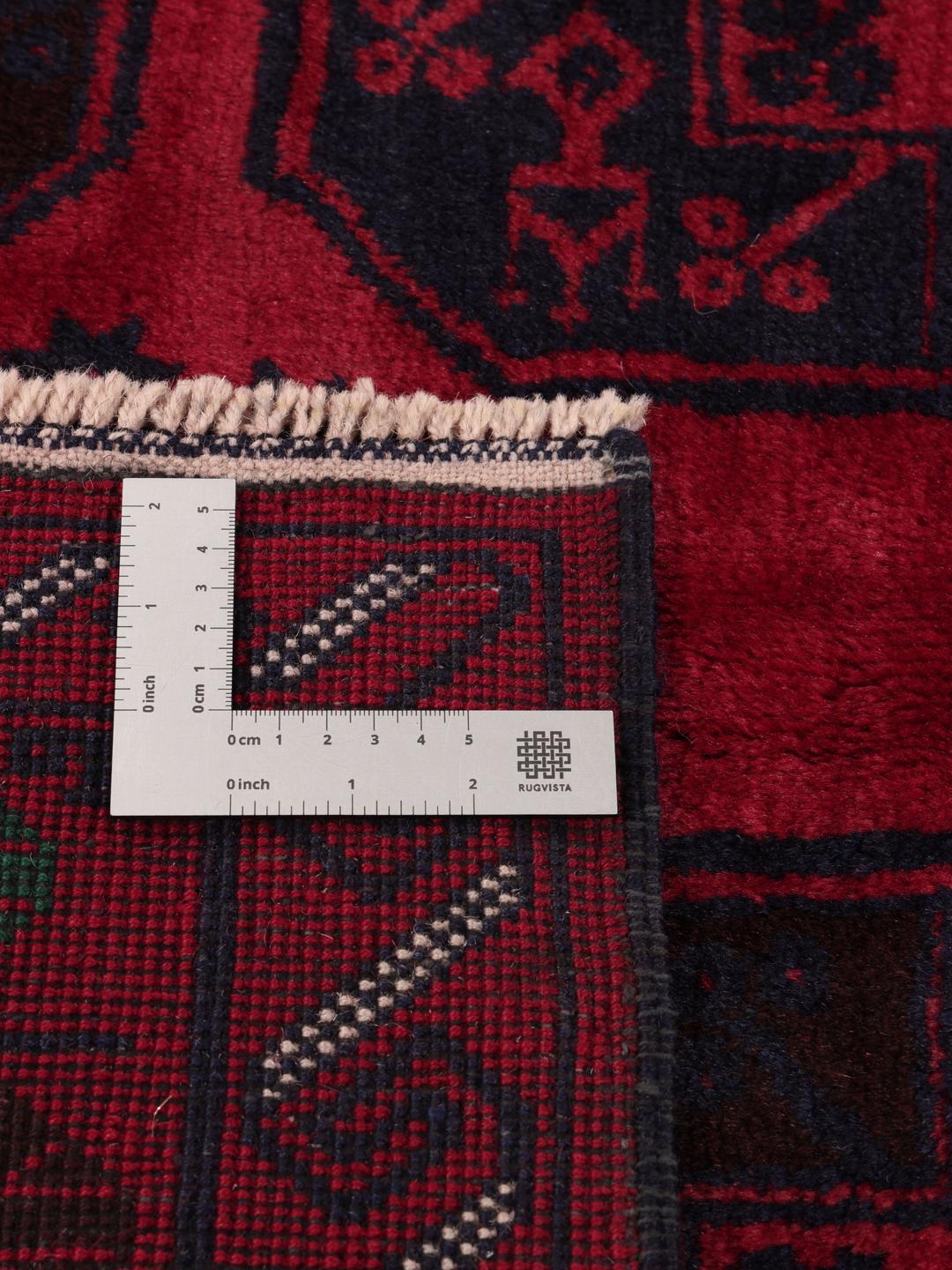 Handgeknoopte Beluch loper uit Afghanistan in dieprood met geometrische patronen