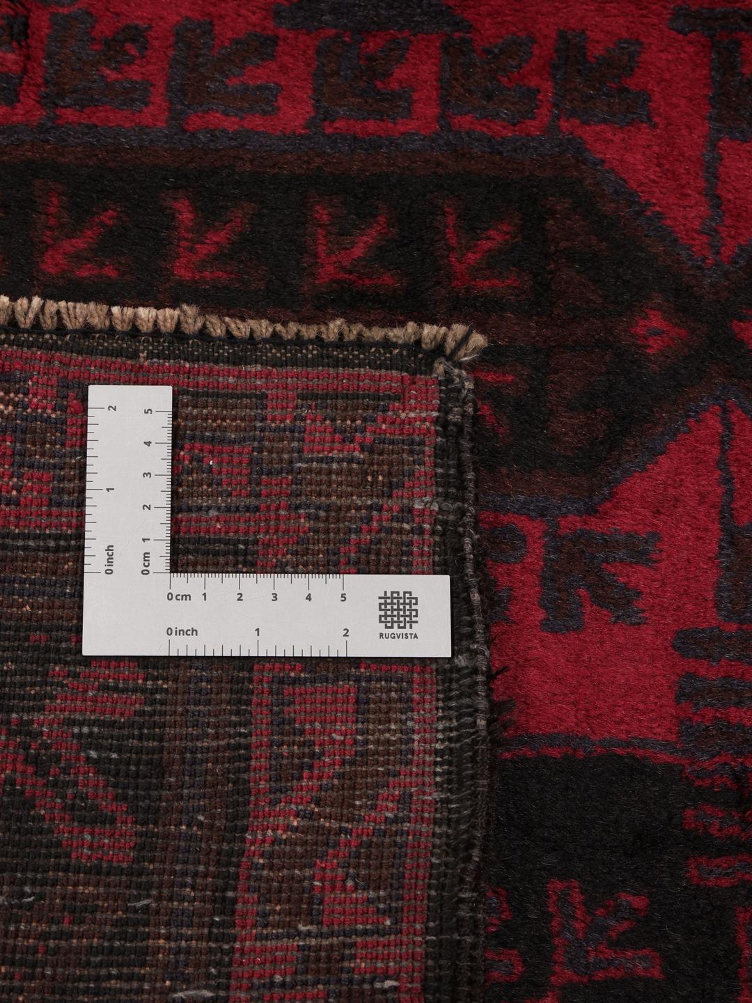 Håndknyttet løber fra Afghanistan i rød og sort