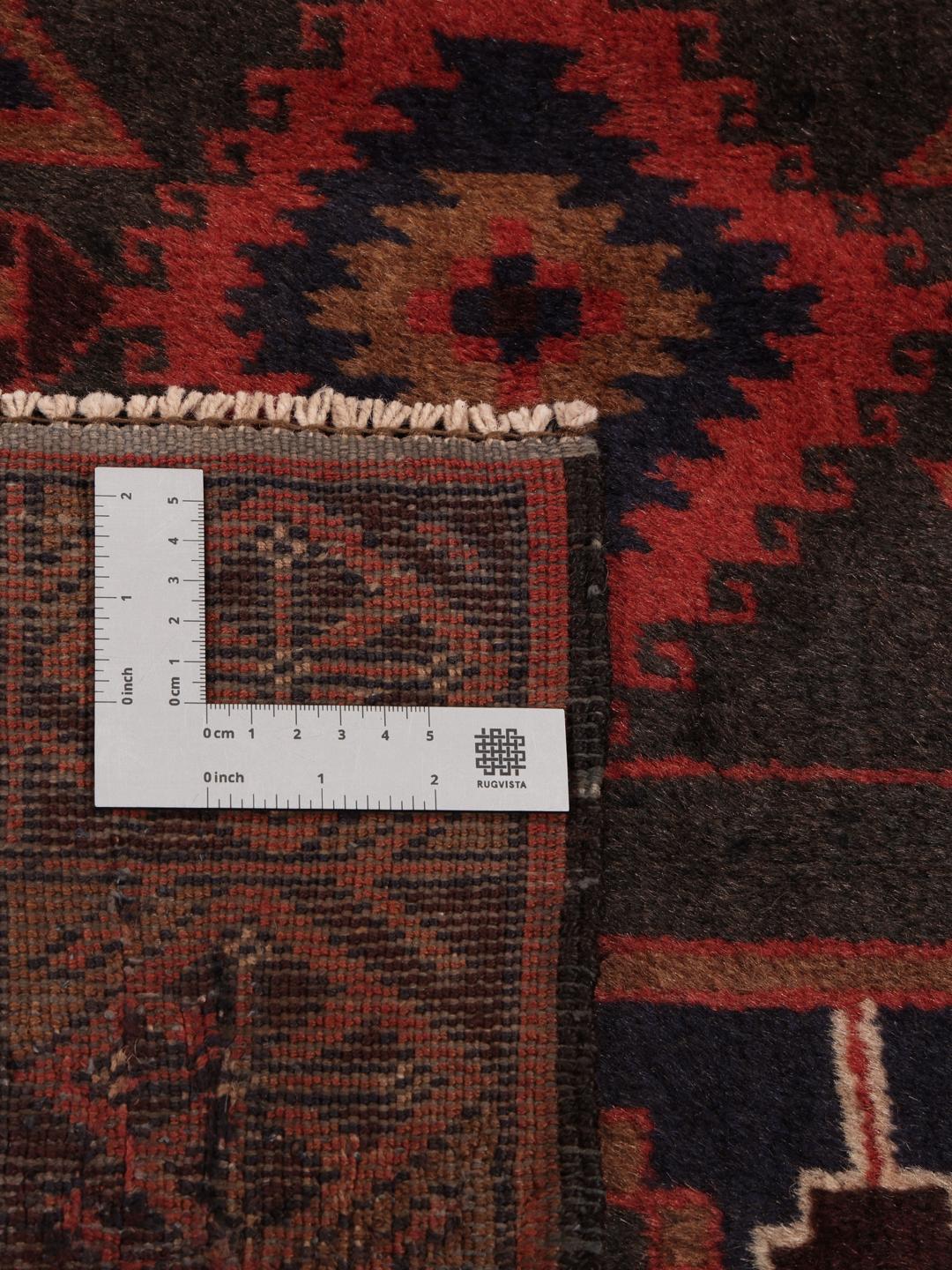 Handgeknoopte Afghaanse loper in rode en donkere tinten
