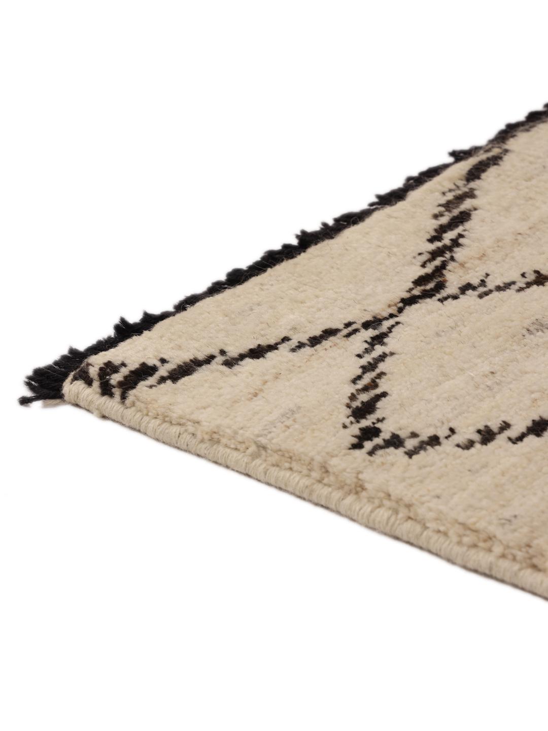 Hand-knotted Afghan Berber Style rug in beige with a geometric pattern.