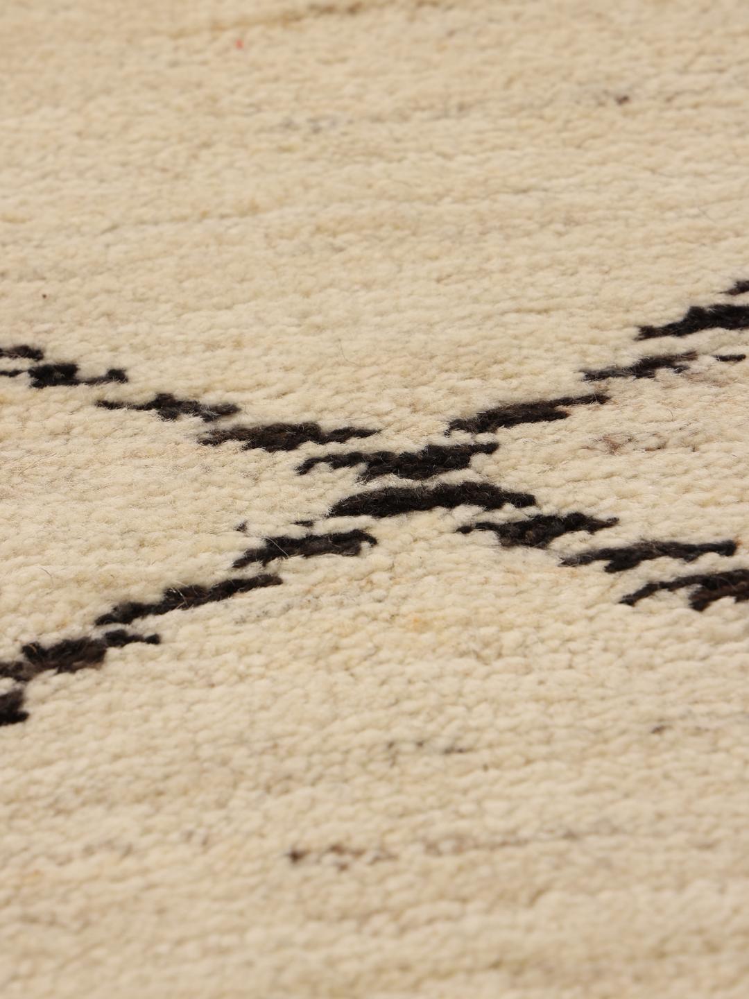 Hand-knotted Afghan Berber Style rug in beige with a geometric pattern.