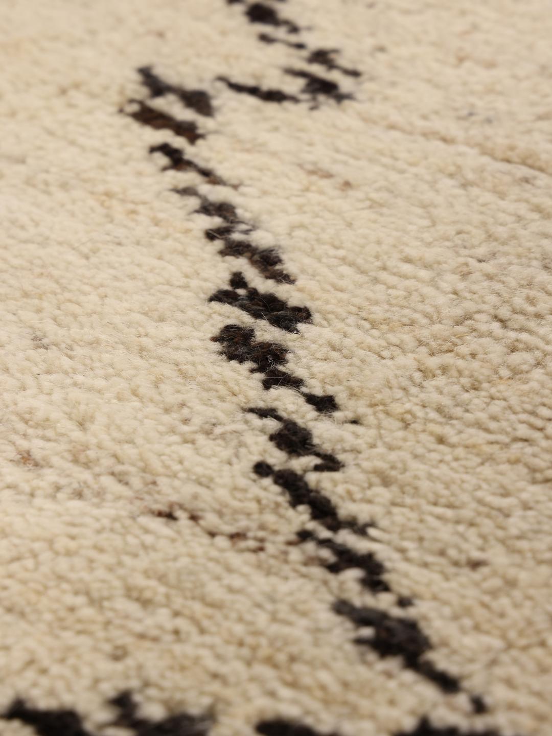 Hand-knotted Afghan Berber Style rug in beige with a geometric pattern.