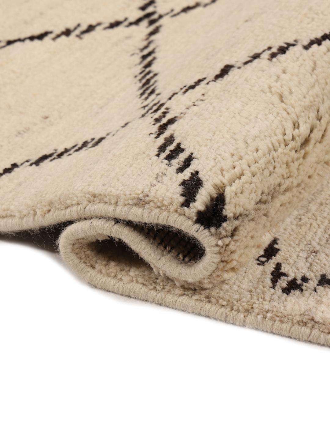 Hand-knotted Afghan Berber Style rug in beige with a geometric pattern.