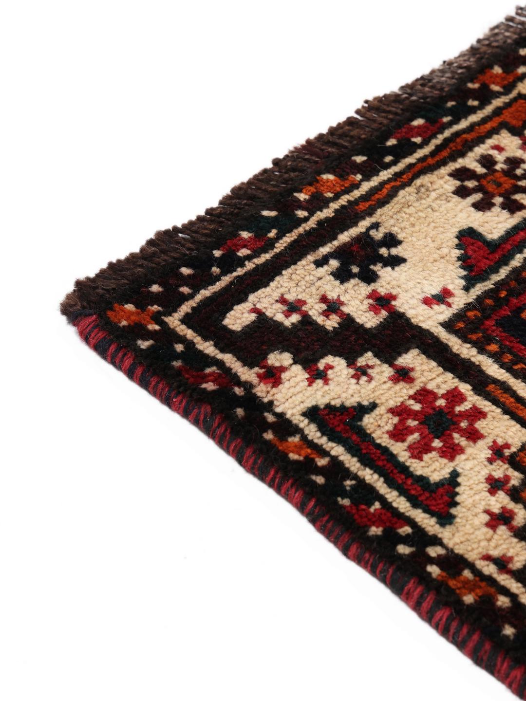 Hand-knotted Shiraz rug with geometric patterns in red and black