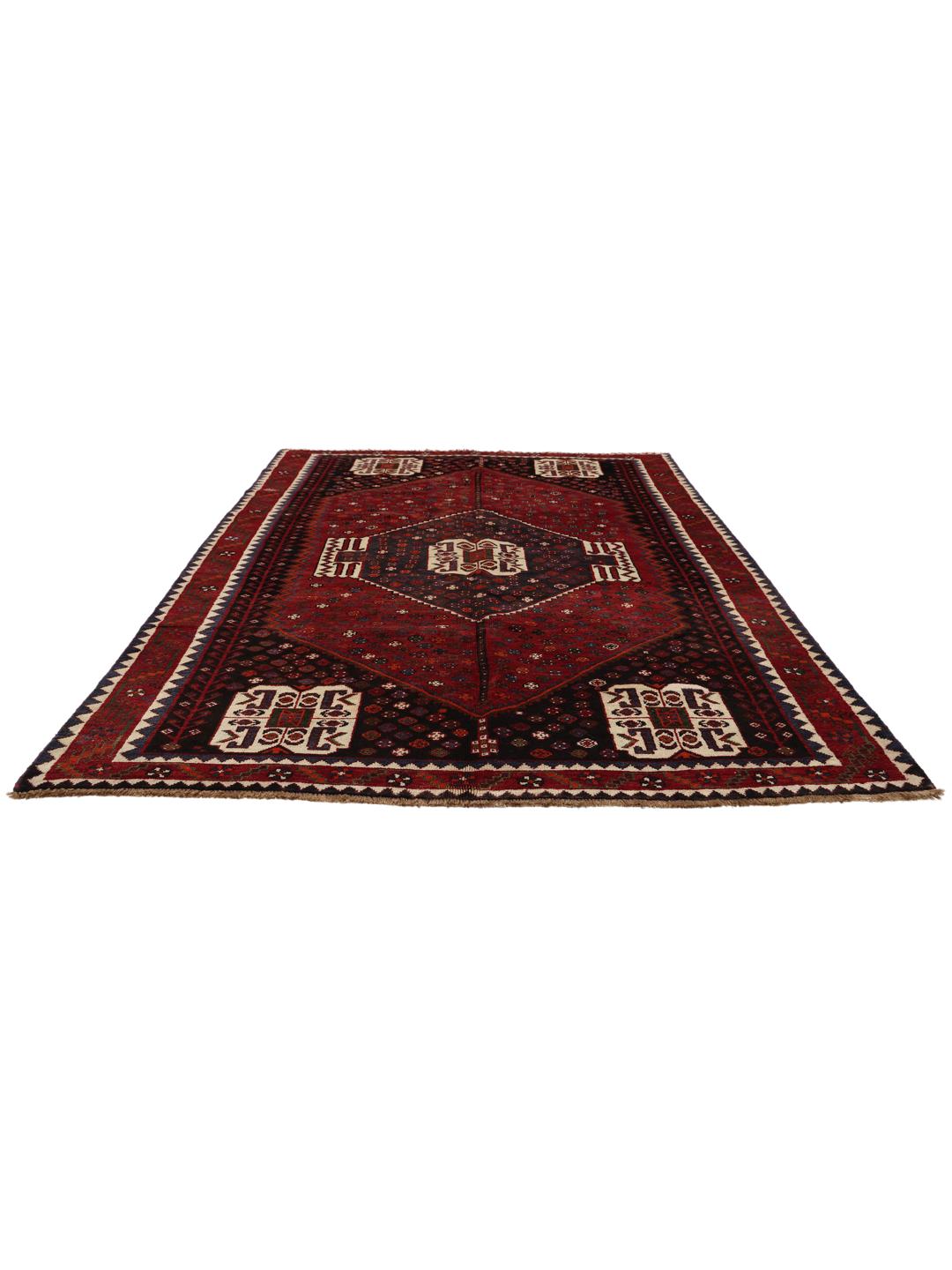 Hand-knotted Shiraz rug from the Middle East in deep red and black tones