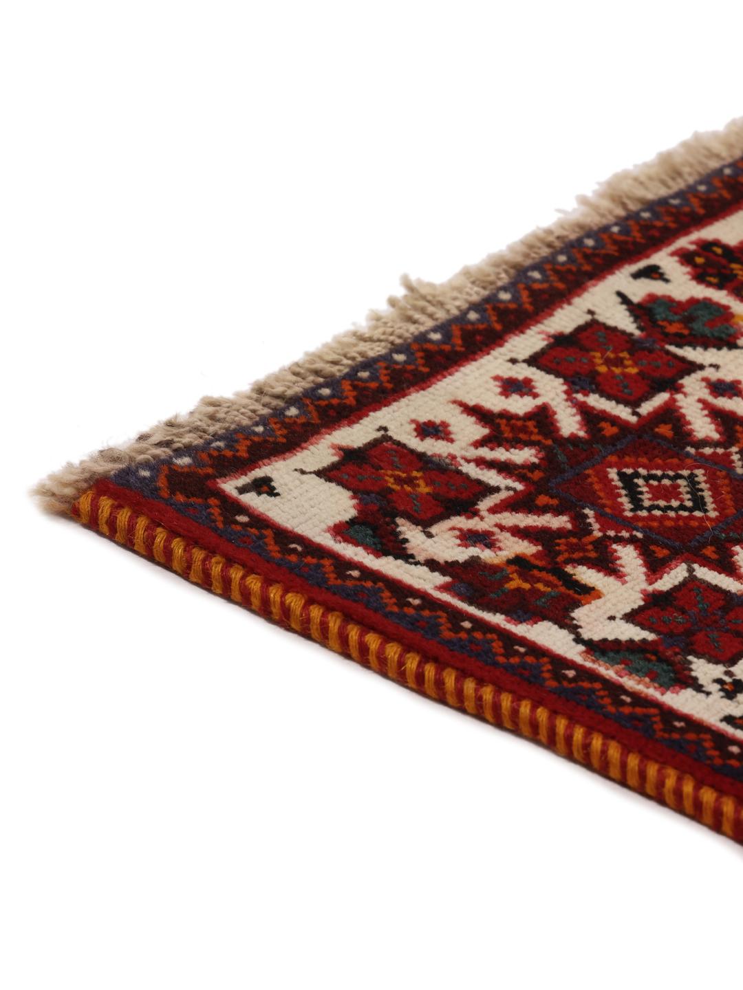 Handmade Shiraz rug from the Middle East in dark-red and dark-blue tones