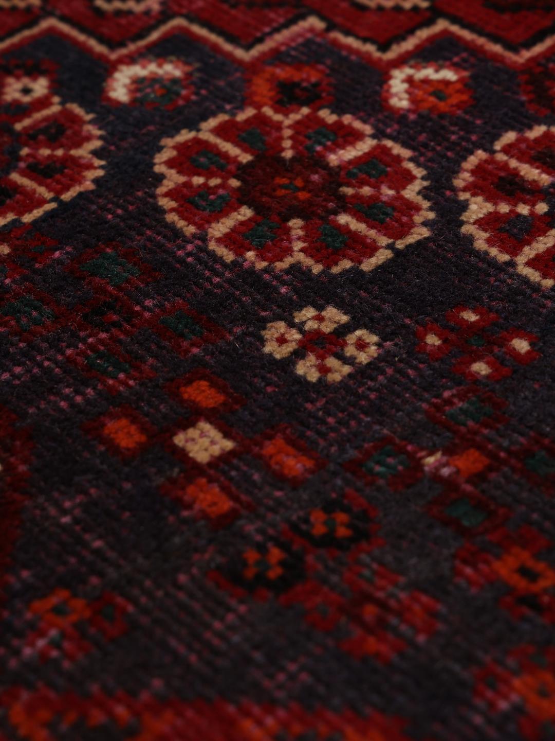 Handmade Shiraz rug from the Middle East in dark-red and dark-blue tones
