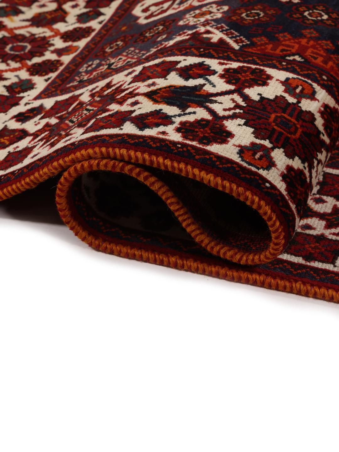 Handmade Shiraz rug from the Middle East in dark-red and dark-blue tones