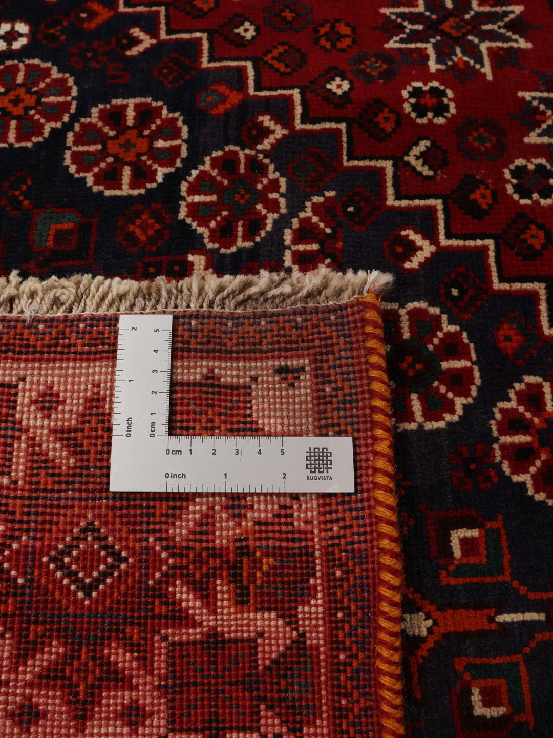 Handmade Shiraz rug from the Middle East in dark-red and dark-blue tones