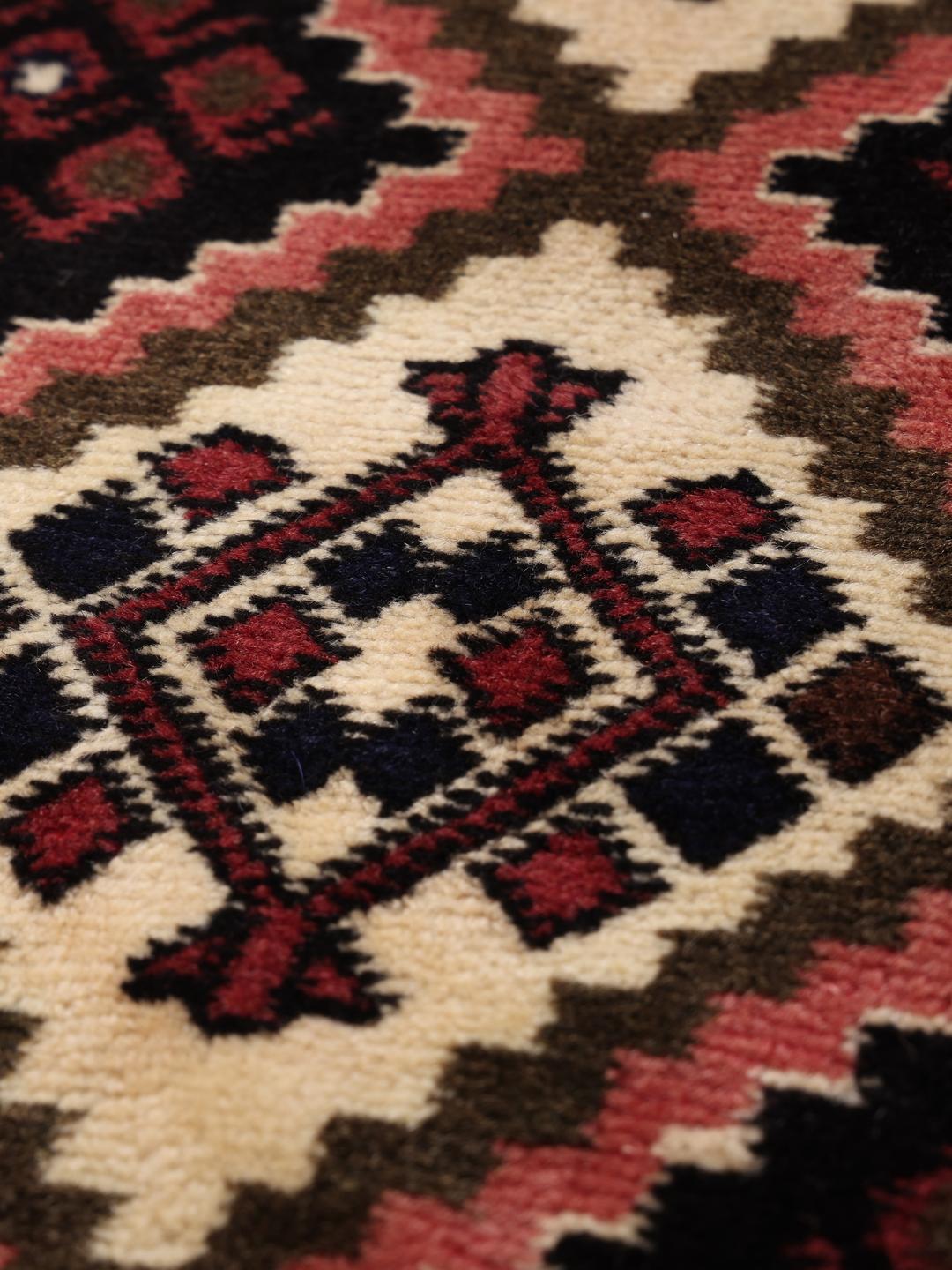 Hand-knotted Afshar Shahre Babak rug from the Middle East in deep red and dark blue.