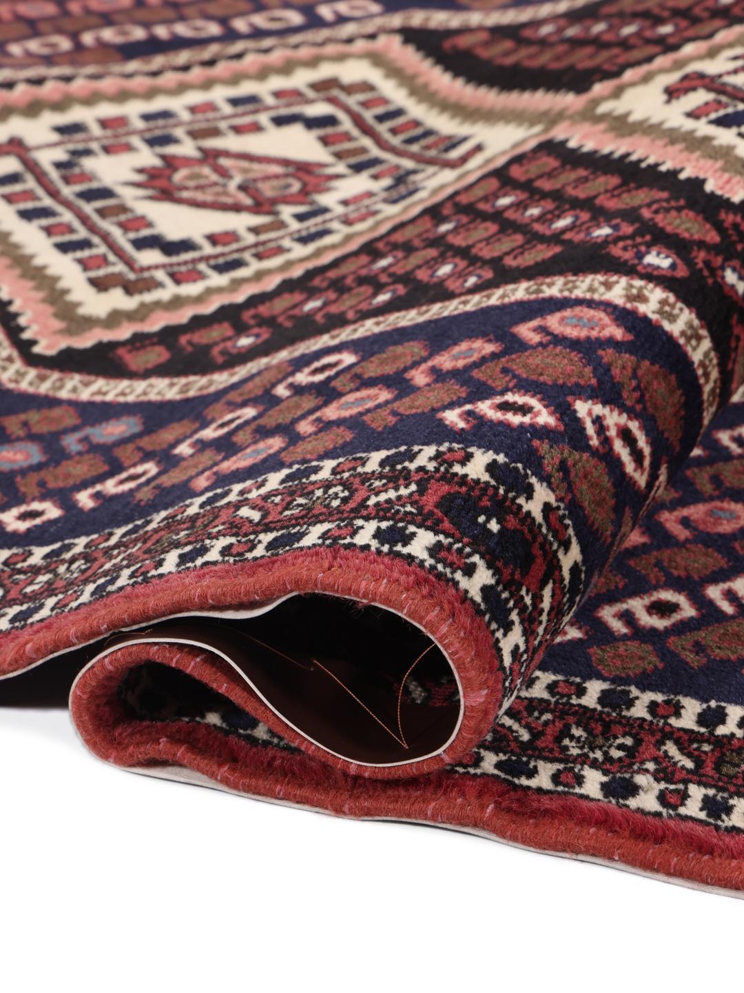 Hand-knotted Afshar Shahre Babak rug from the Middle East in deep red and dark blue.