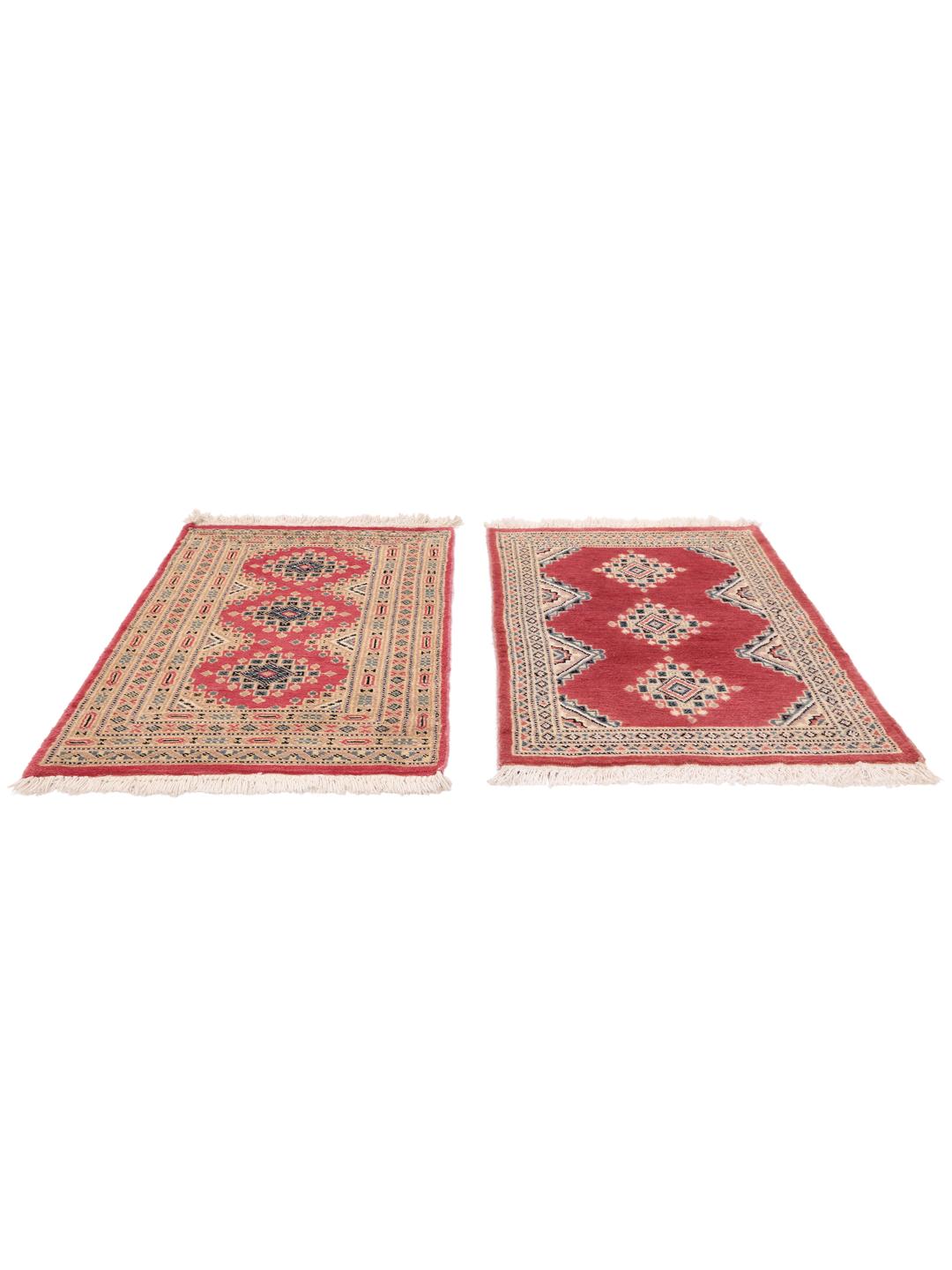 A hand-knotted red Pakistan Bokhara 2ply rug with geometric motifs