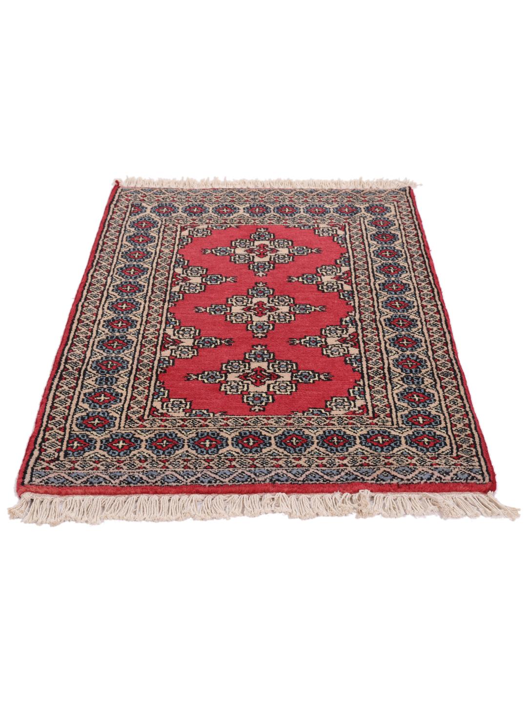 Hand-knotted Pakistan Bokhara rug in red with geometric motifs