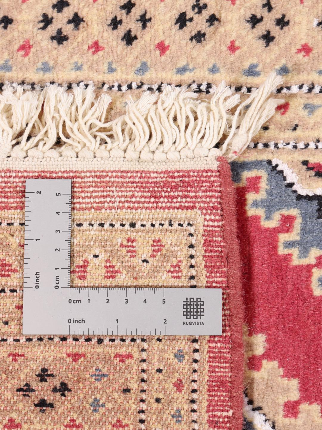 A set of two rectangular hand-knotted red Pakistan Bokhara rugs with intricate geometric patterns