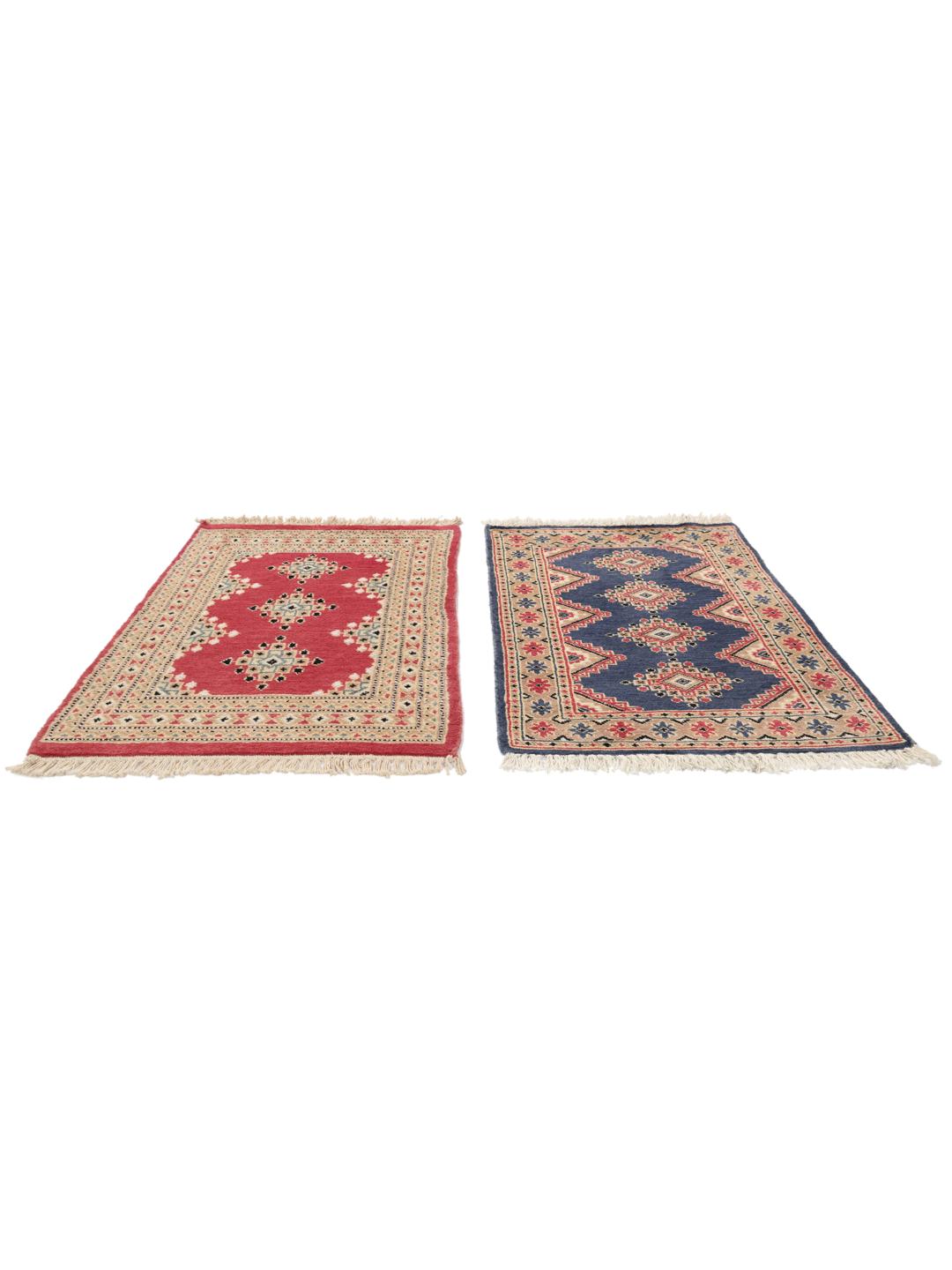 Hand-knotted wool rug from Pakistan in red and blue tones