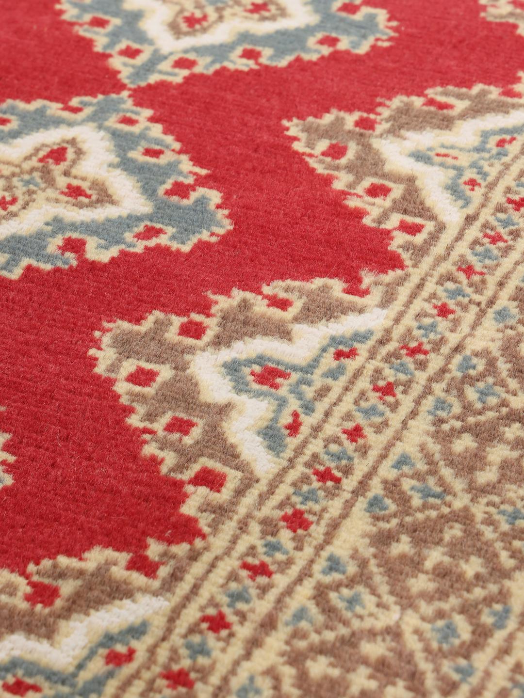 Hand-knotted red and blue Pakistan Bokhara 2ply rug