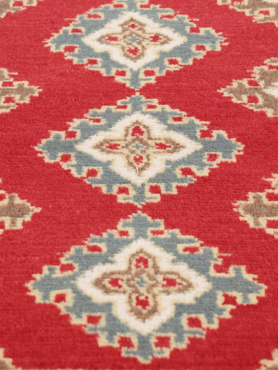 Hand-knotted red and blue Pakistan Bokhara 2ply rug