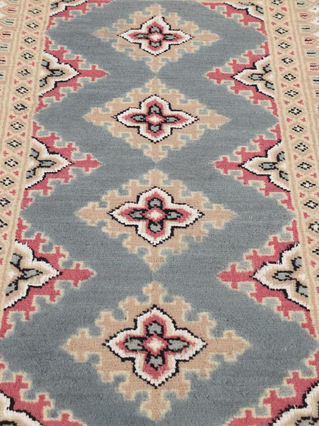Hand-knotted Pakistan Bokhara 2ply rug in multicolor