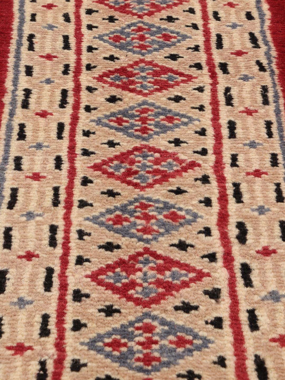 Hand-knotted Pakistan Bokhara 2ply rug with red and beige geometric patterns