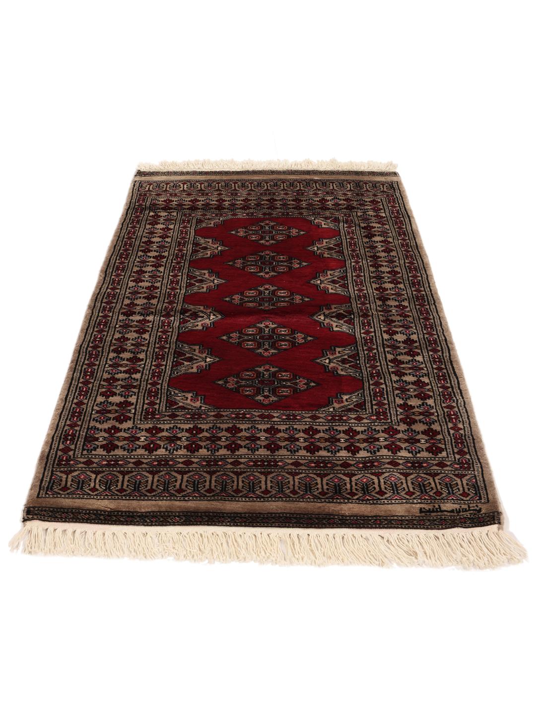 Hand-knotted Pakistan Bokhara rug with a red field and geometric motifs