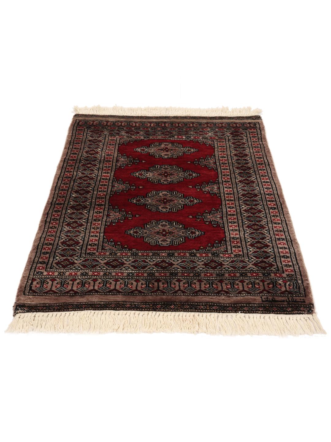 Hand-knotted Pakistan Bokhara rug with a red field and geometric motifs
