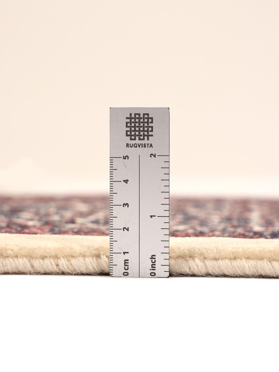 Handgeknoopte Bidjar loper met ingewikkelde bloemmotieven in rode en beige tinten