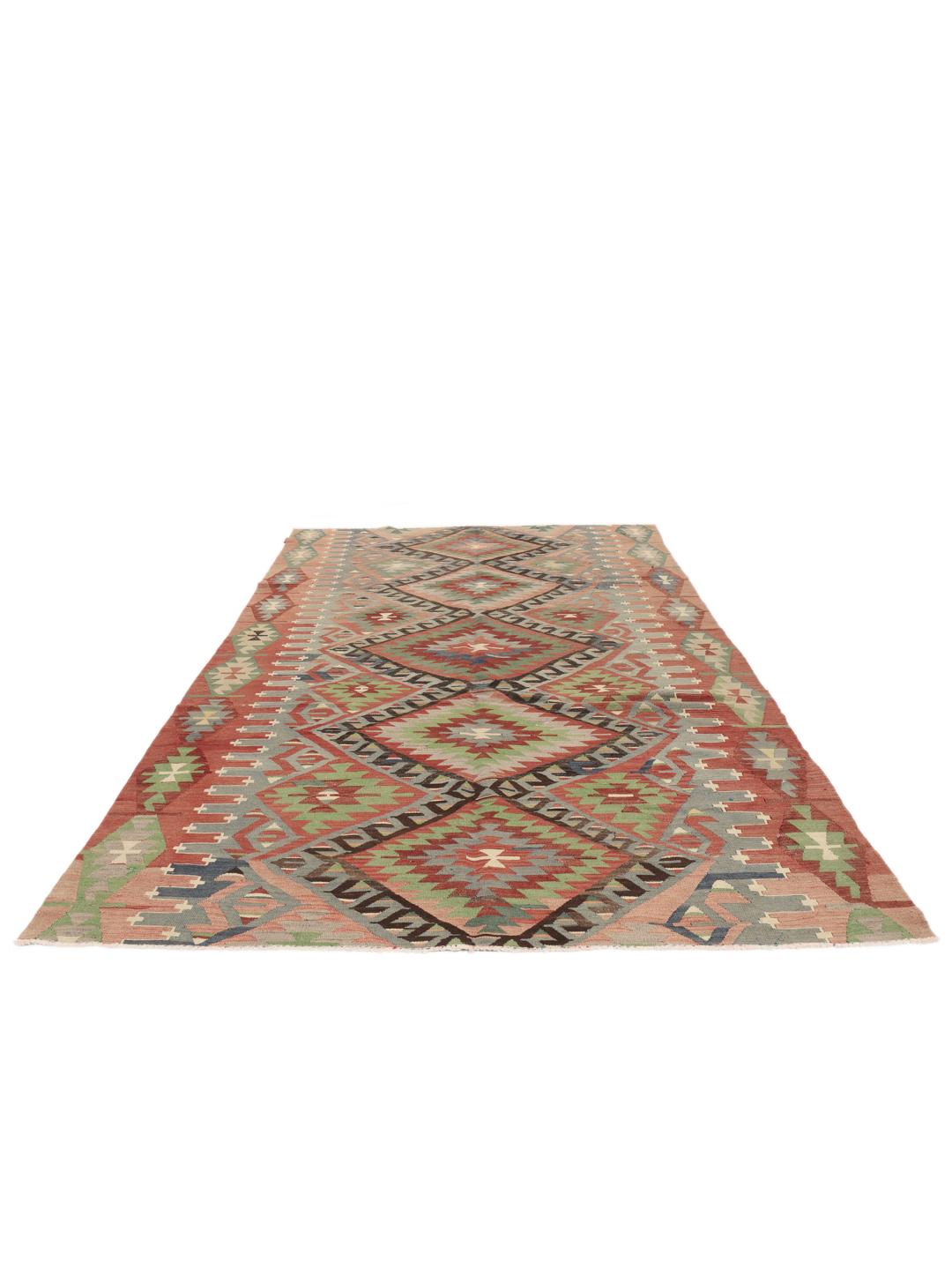 Tapis Kelim turc vintage avec des motifs géométriques dans des tons de rouge, vert et bleu