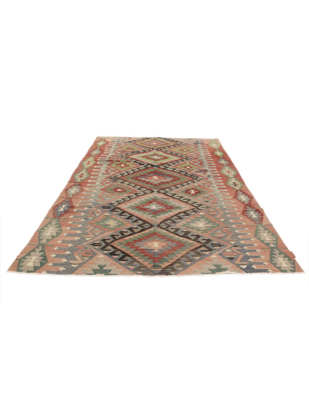 Tapis Kelim turc vintage avec des motifs géométriques dans des tons de rouge, vert et bleu