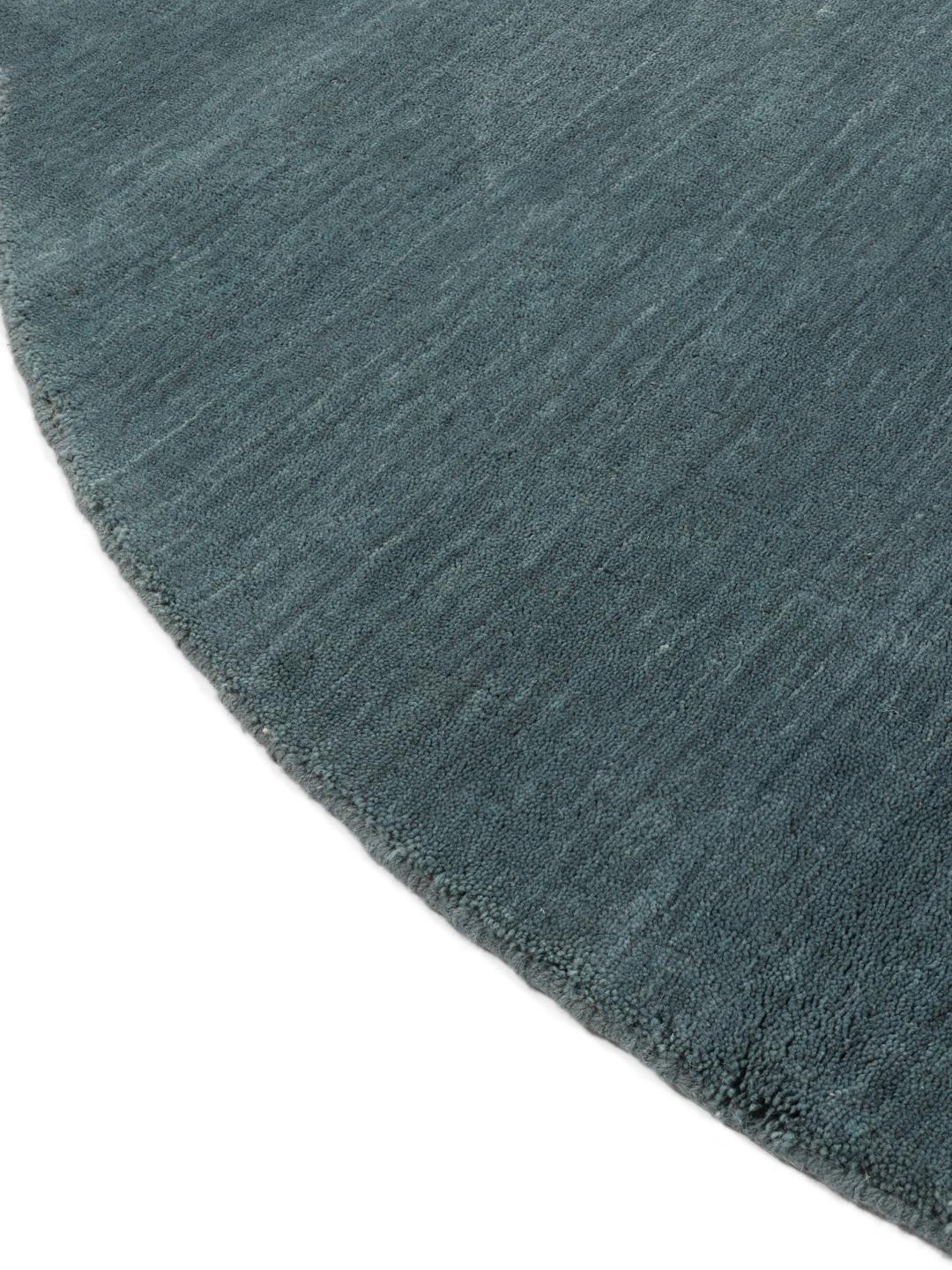 Tapis rond en laine tissé à la main bleu sarcelle