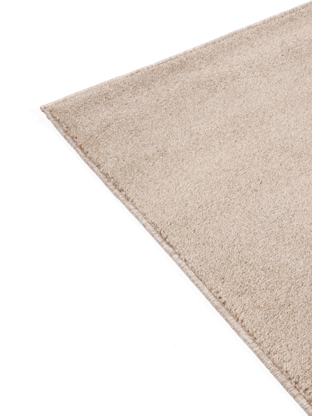 Beige vloerkleed met een zachte pool