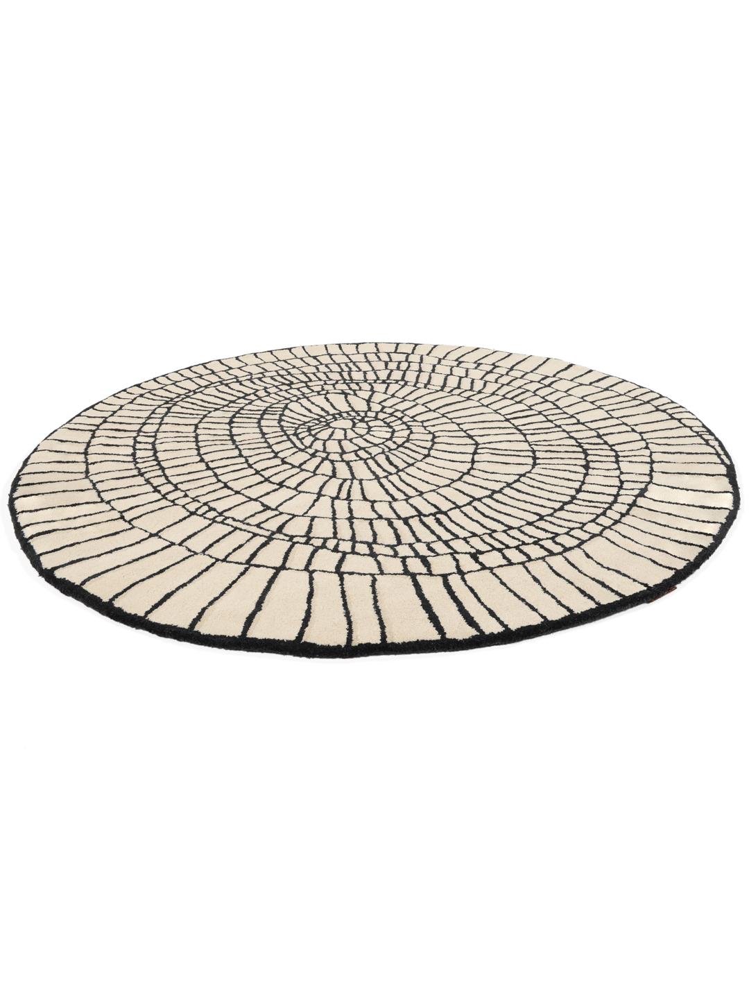 Rond beige en zwart tapijt