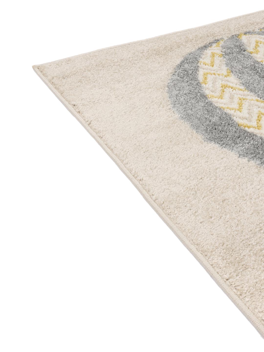 Beige tæppe med varmluftsballoner og sky-motiver