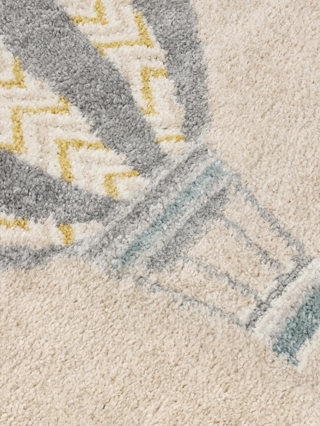 Beige tæppe med varmluftsballoner og sky-motiver