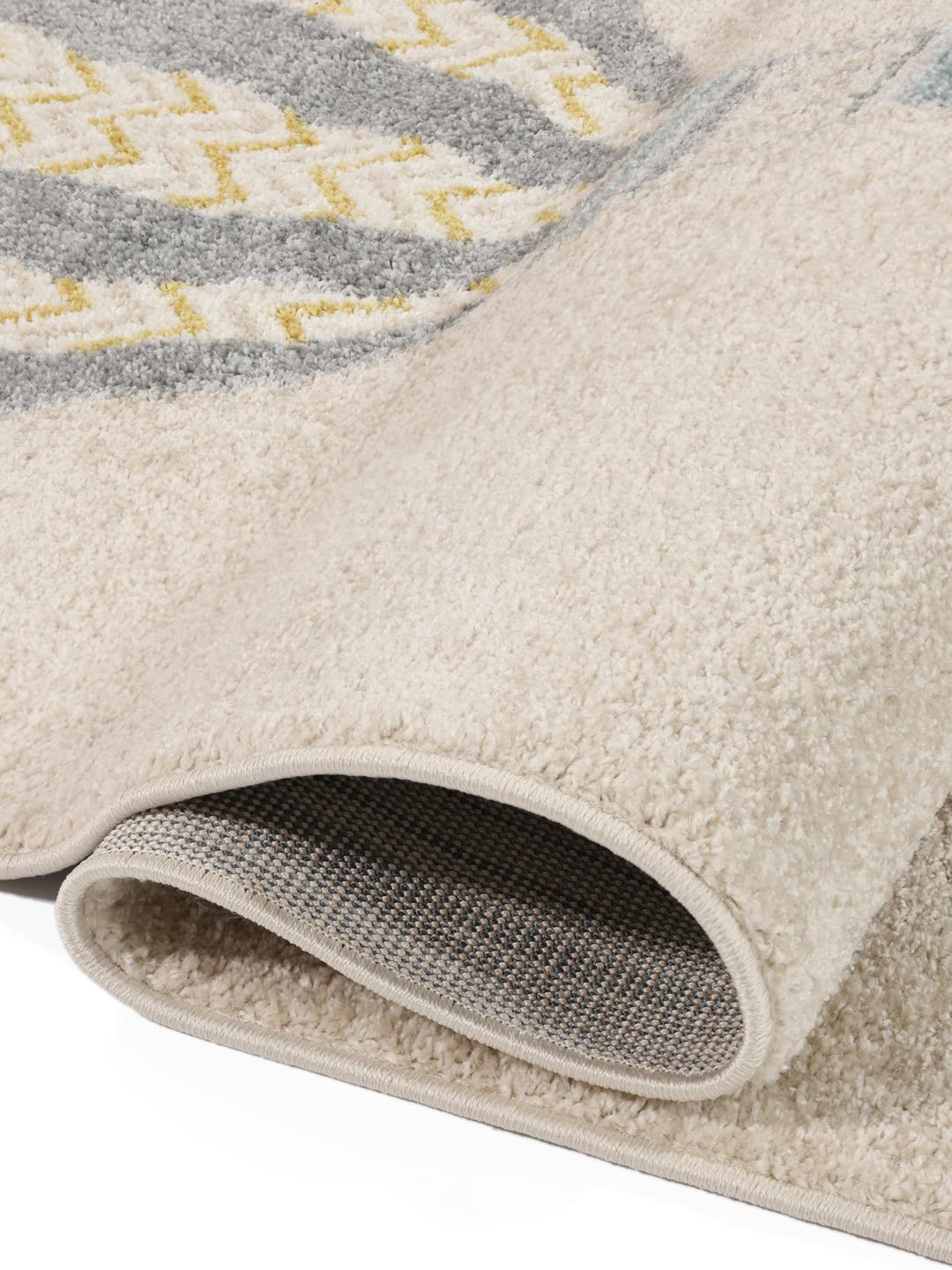 Beige tæppe med varmluftsballoner og sky-motiver