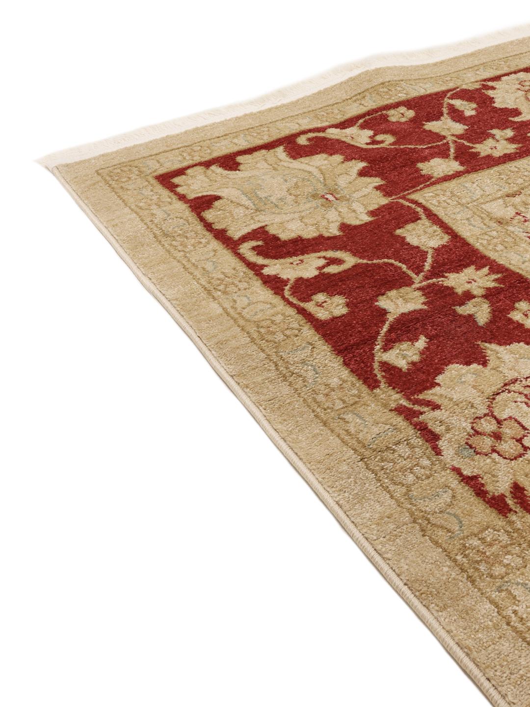 Tappeto beige e rosso con motivi floreali