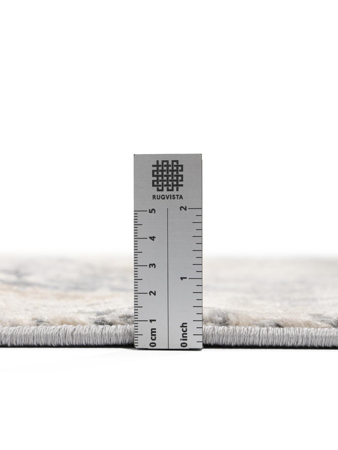 Rond vloerkleed in grijs en beige