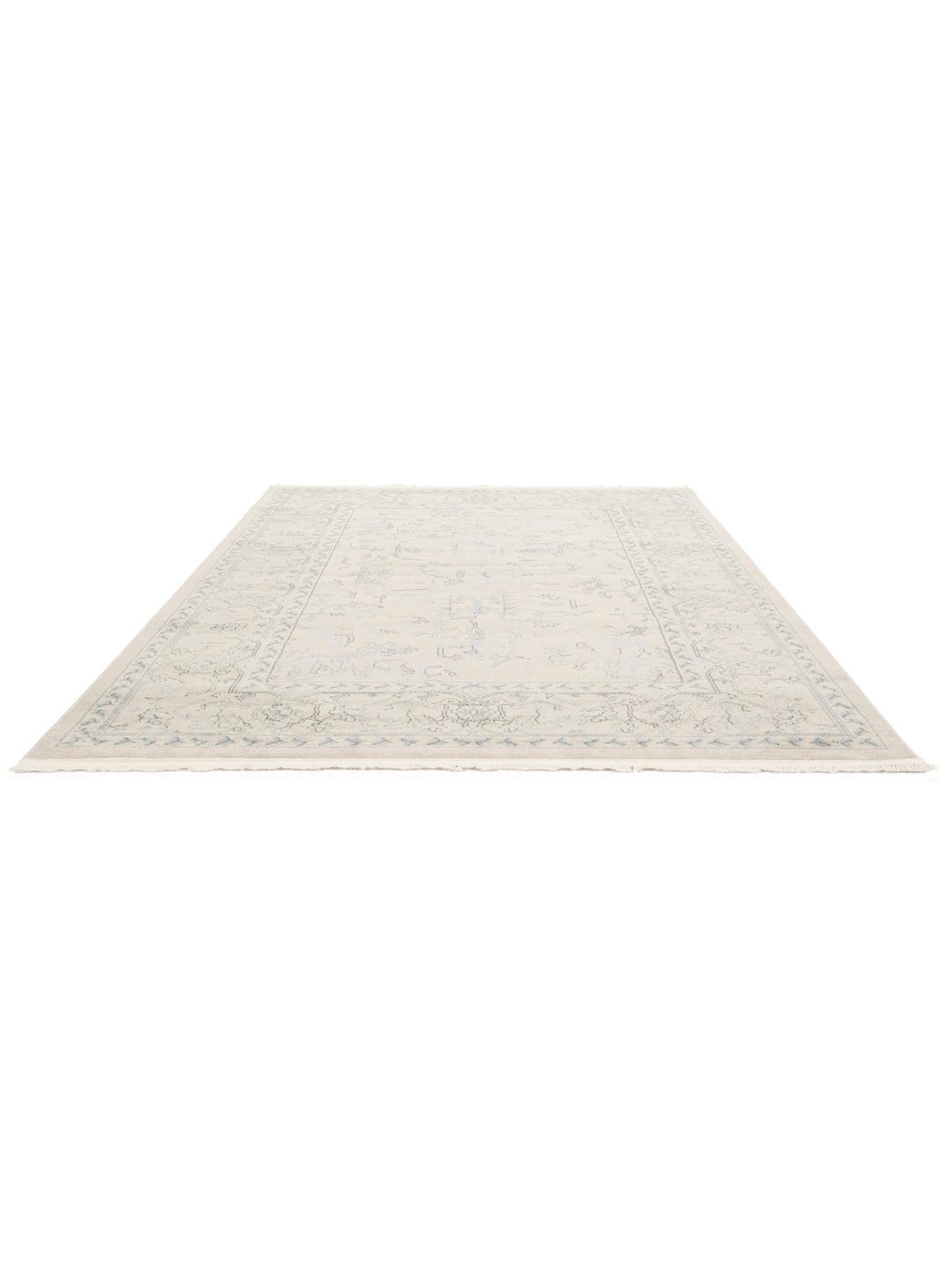 vierkant beige en lichtblauw tapijt met franjes