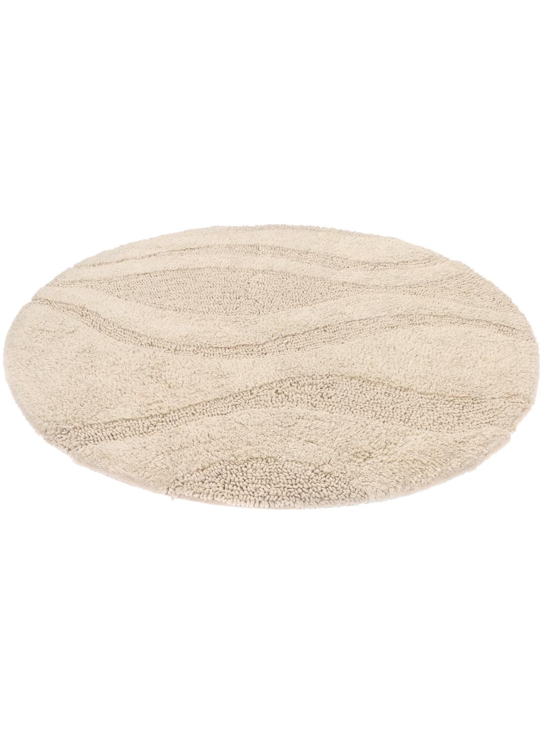 Tapis de bain rond beige avec un motif en relief ondulé texturé