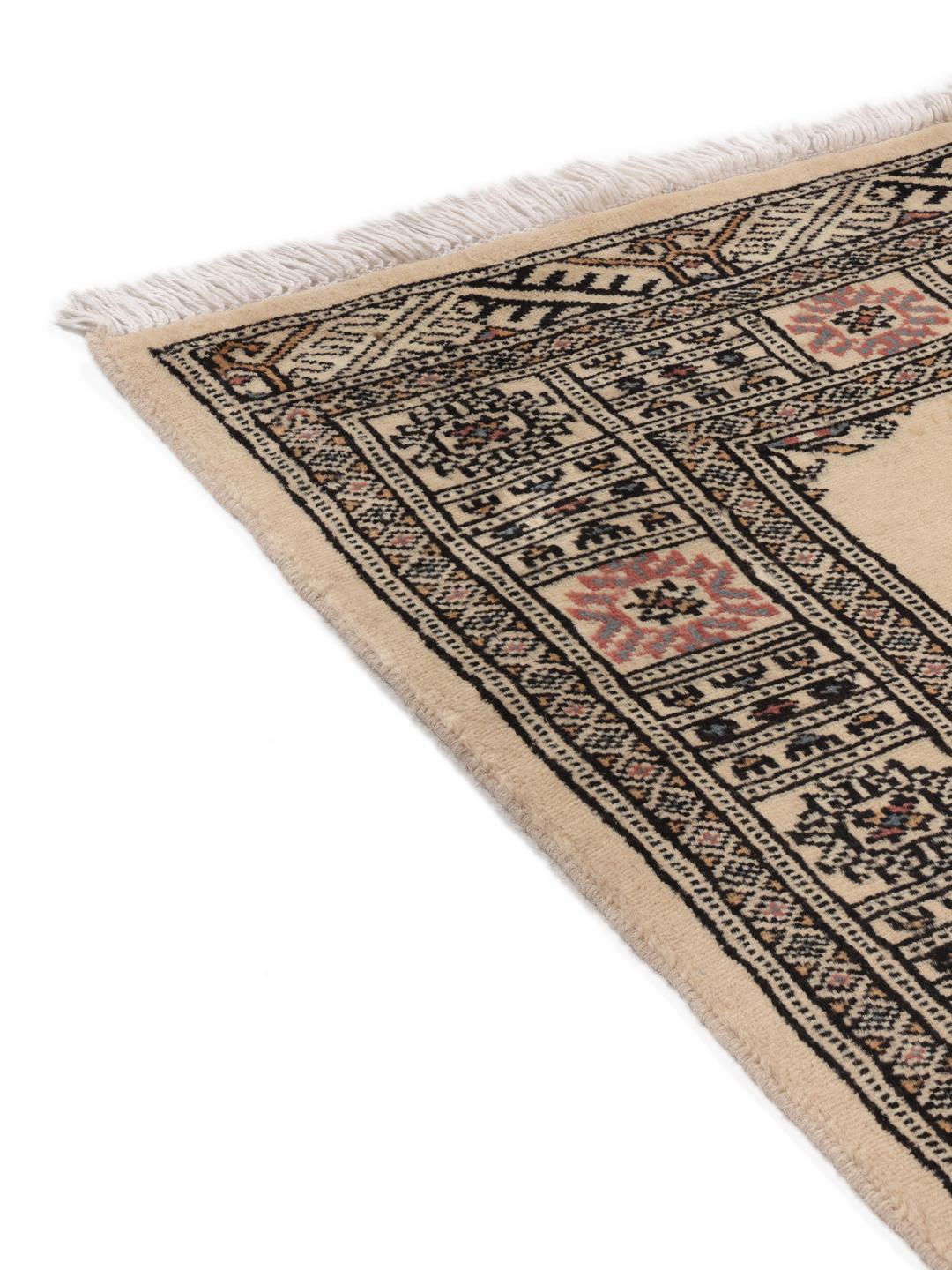 Handgeknoopte beige loper uit Pakistan met traditionele geometrische patronen