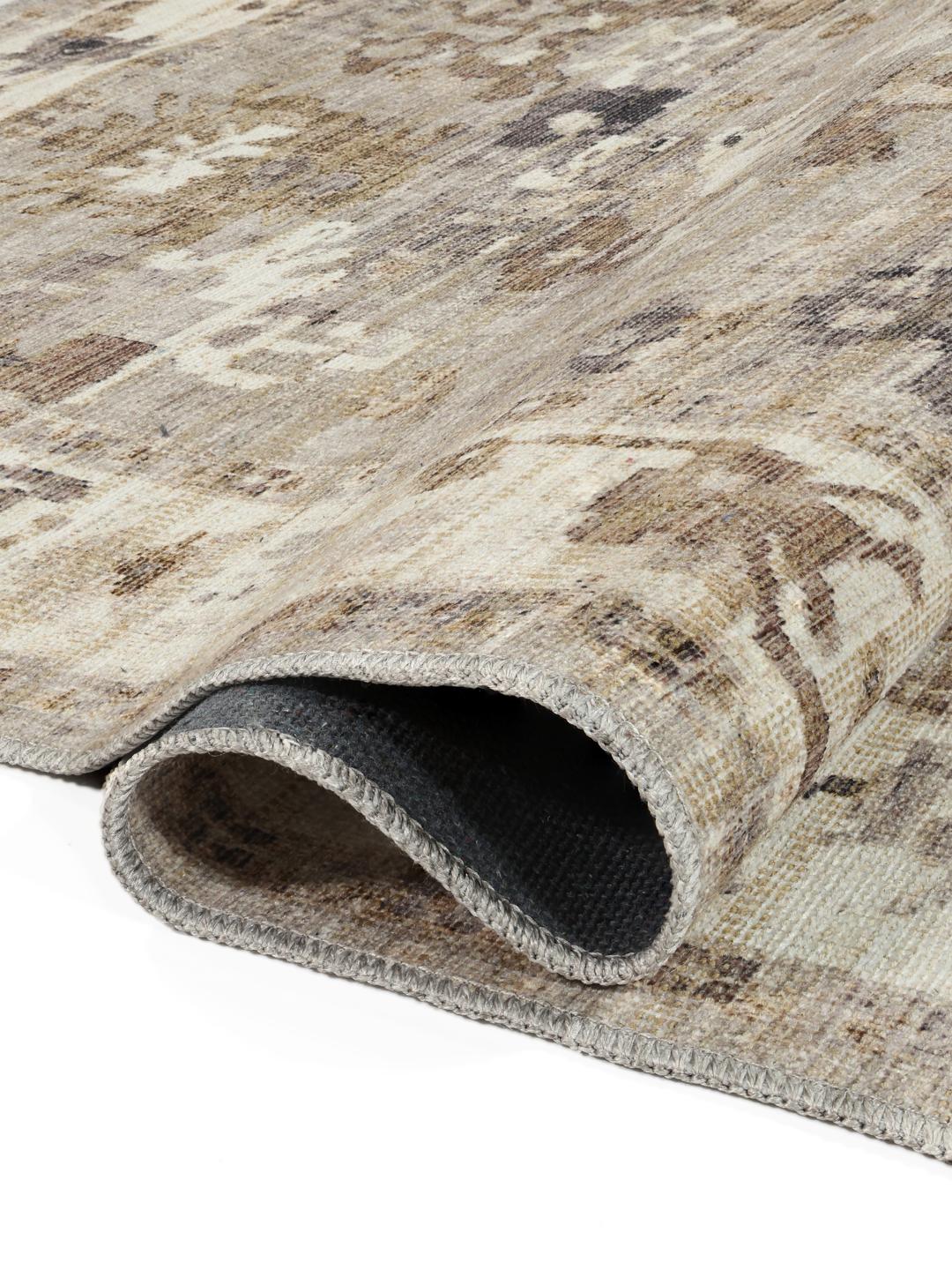 Tapis beige avec motifs traditionnels