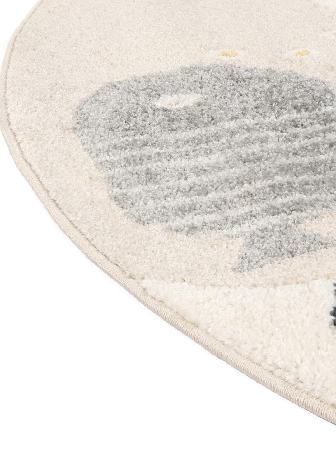 tapis rond rose avec motif marin ludique