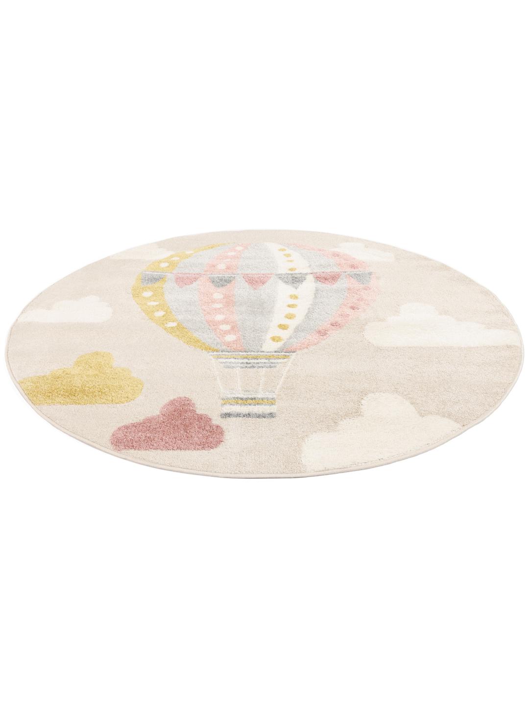rundt beige og pink tæppe med varmluftballon motiv