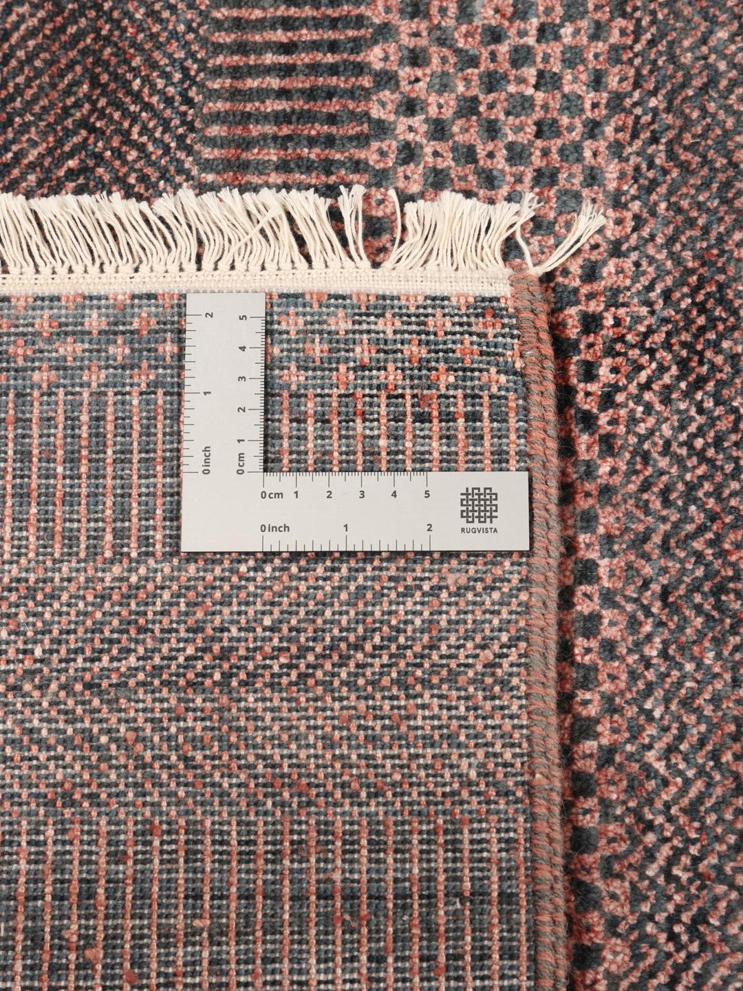 Hand-knotted Indian rug in multicolor with a subtle textured pattern
