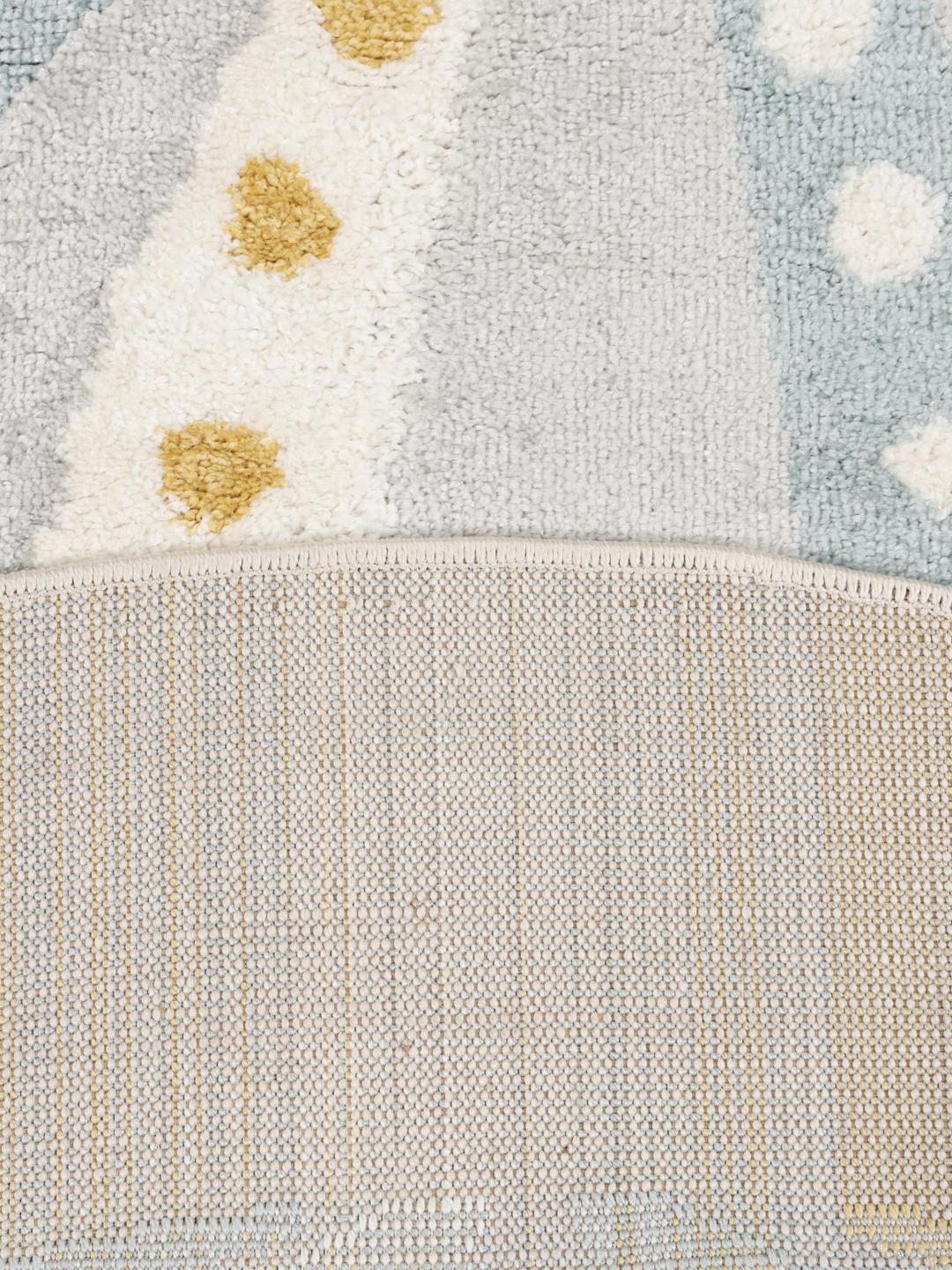 Rond vloerkleed met een luchtballonpatroon in beige en blauw