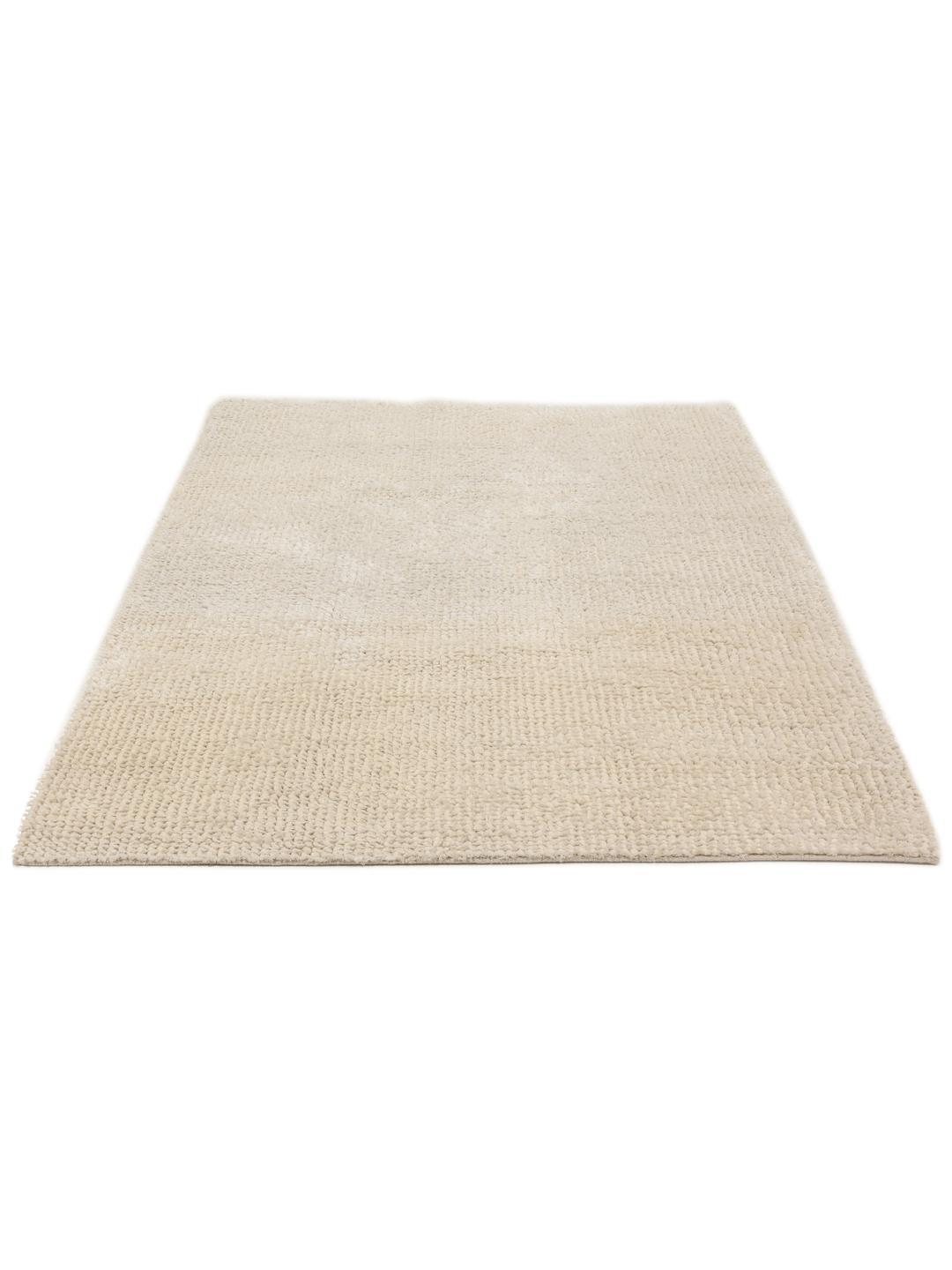 Beige gestructureerd tapijt met een zachte pool