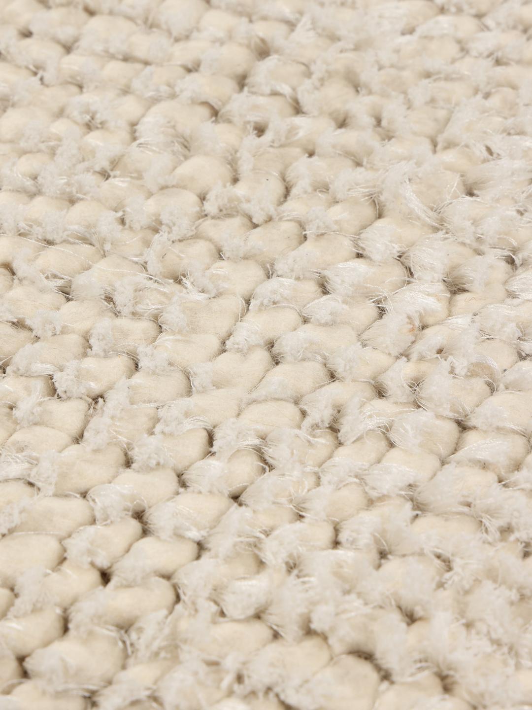 Beige gestructureerd tapijt met een zachte pool