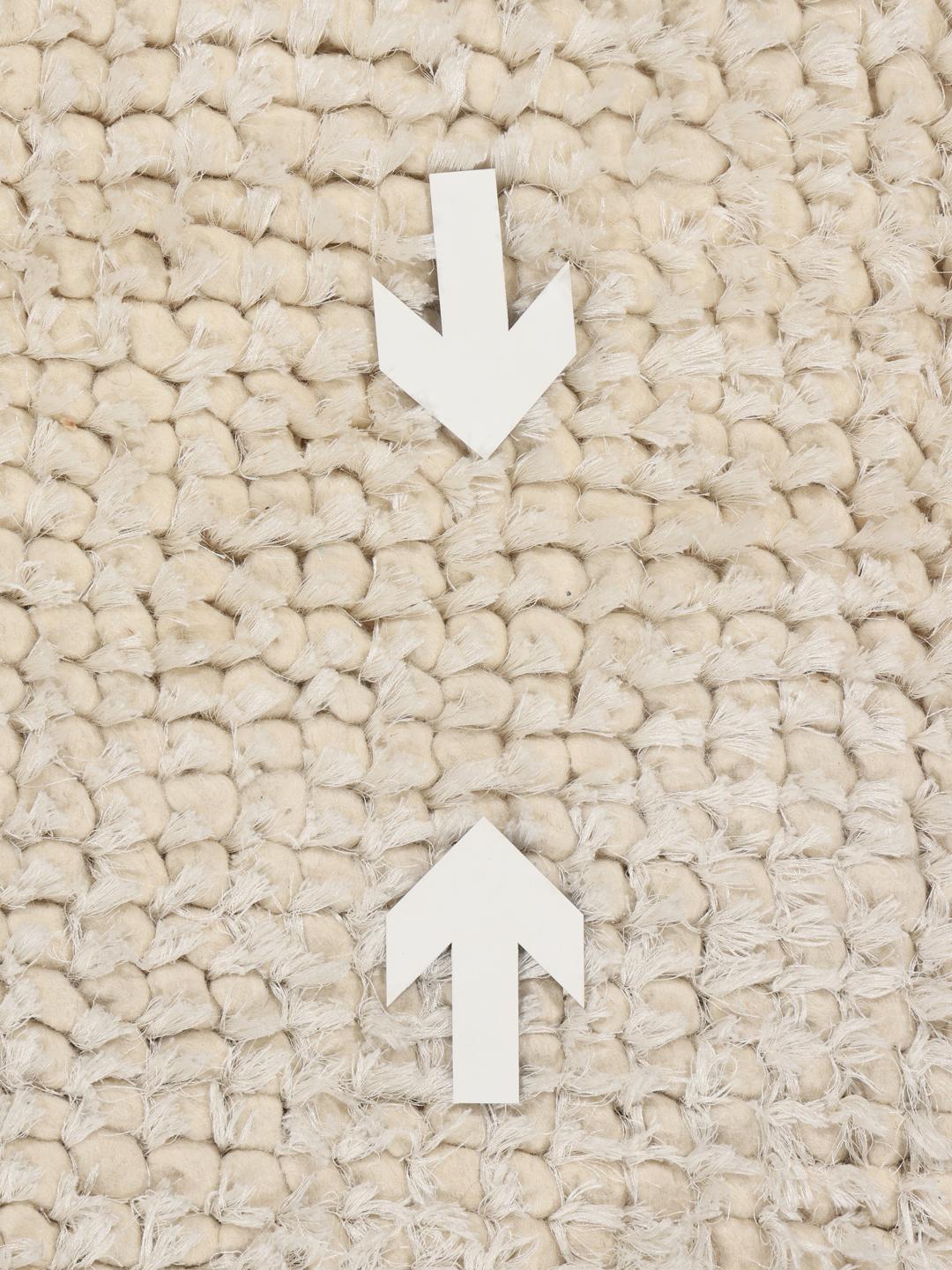 Beige gestructureerd tapijt met een zachte pool