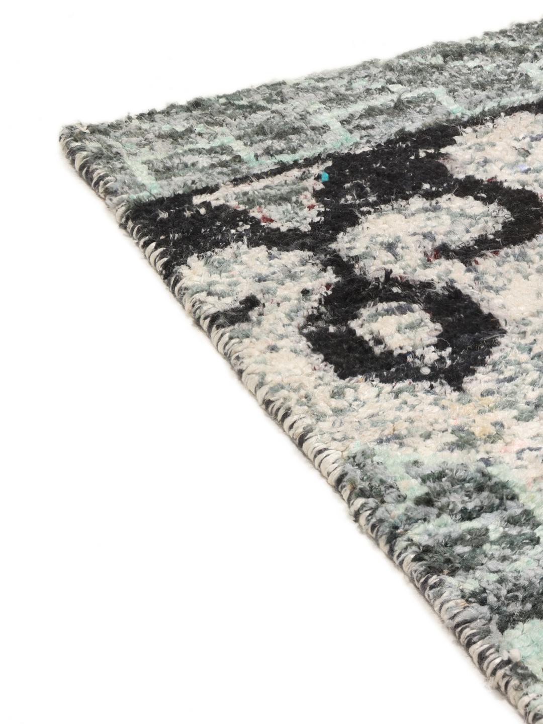 Quito light-blue and grey rug with repeating geometric motifs