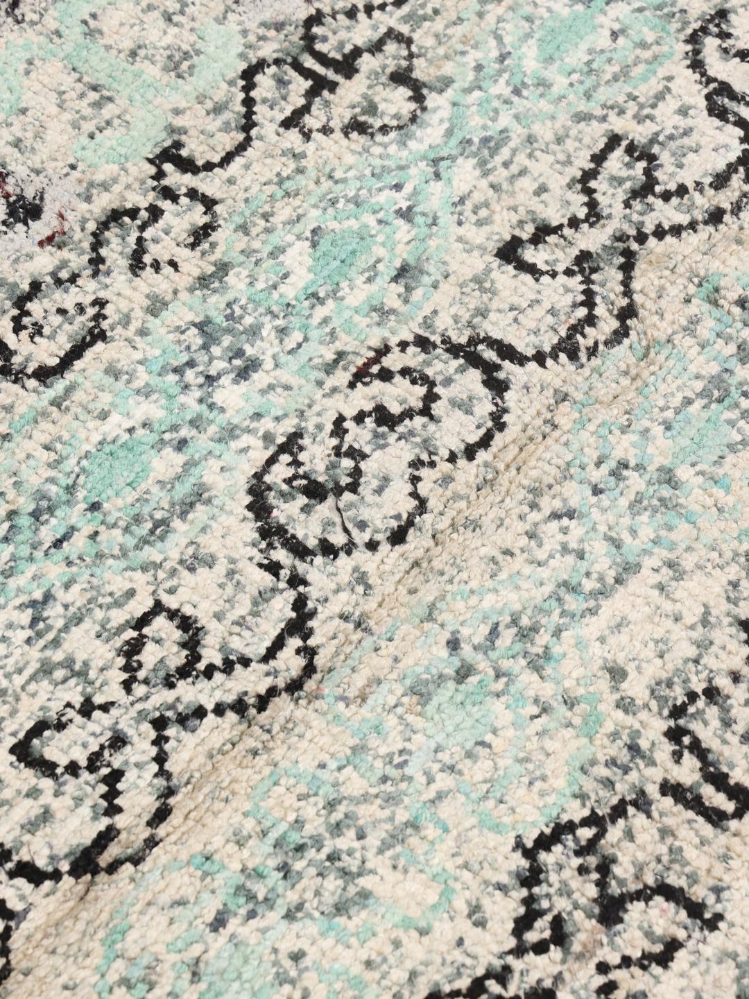 Quito light-blue and grey rug with repeating geometric motifs